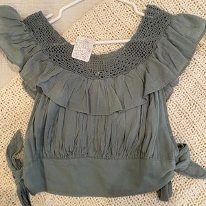Free people top never worn!!